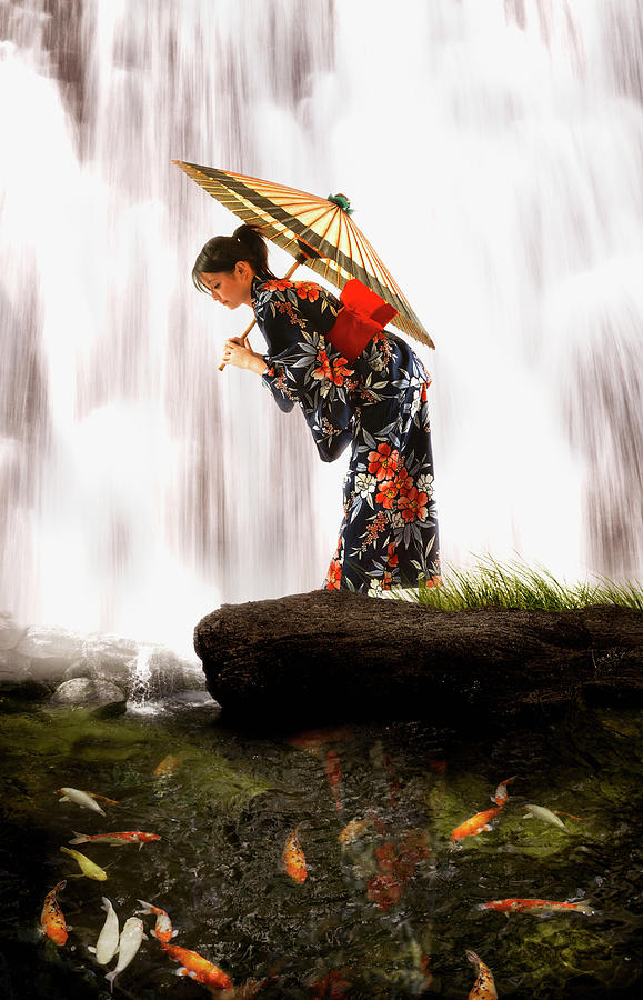 Asian Woman In Geisha Dress Holding Photograph by Colin Anderson Productions Pty Ltd