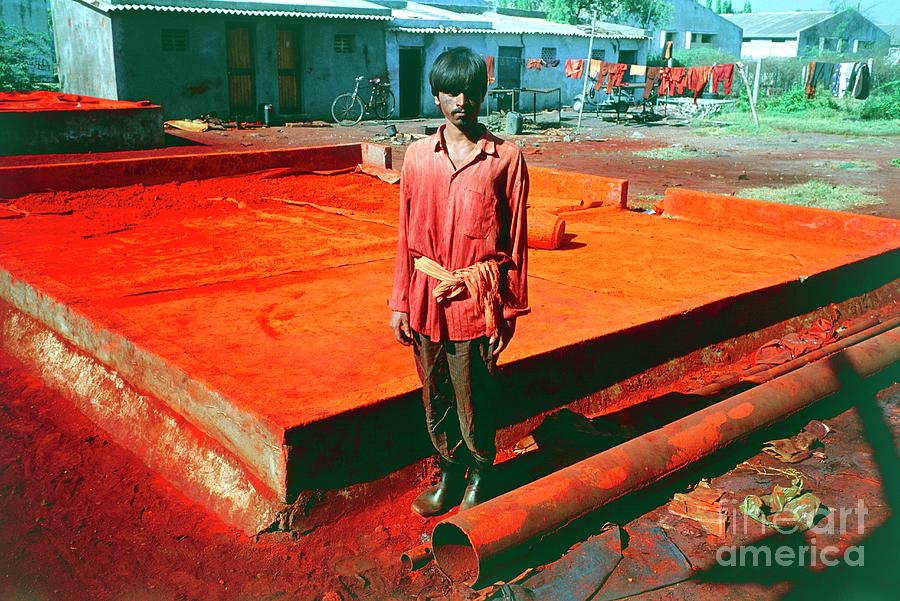 Asian Worker At A Polluting Chemical Dye Factory Photograph by Bob Edwards/science Photo Library