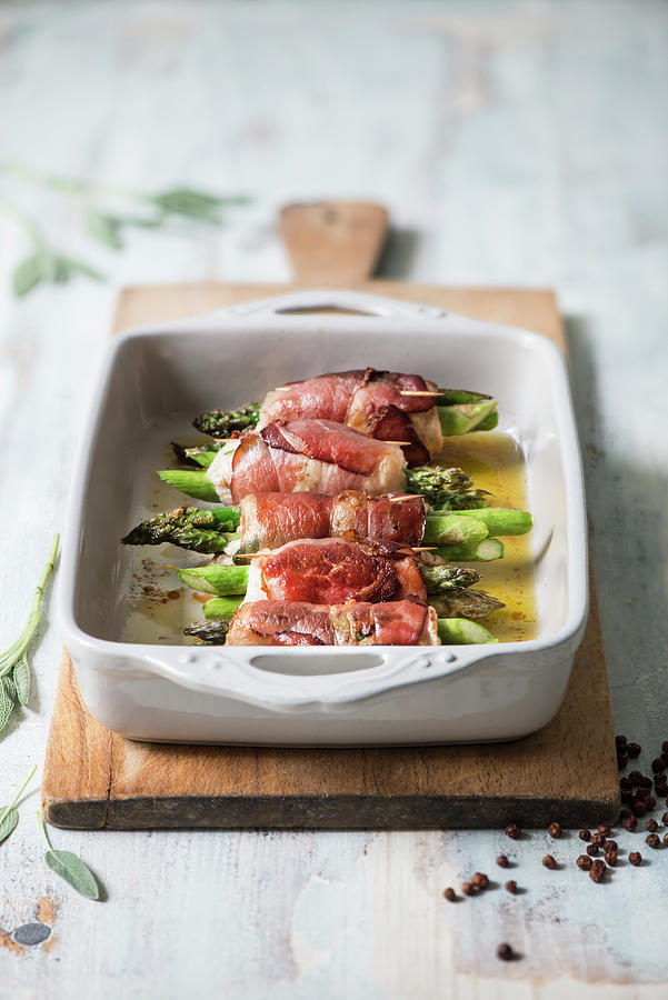 Asparagus And Bacon Saltimbocca With Turkey Fillet Photograph by Fotografie-lucie-eisenmann