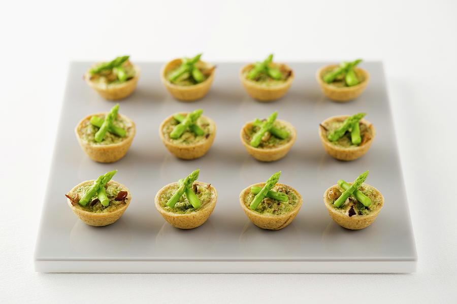 Asparagus And Mushroom Tartlets Photograph by Tim Winter