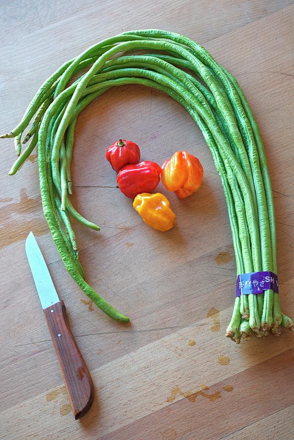 Asparagus Beans From Thailand And Chilli Peppers Photograph by Dr
