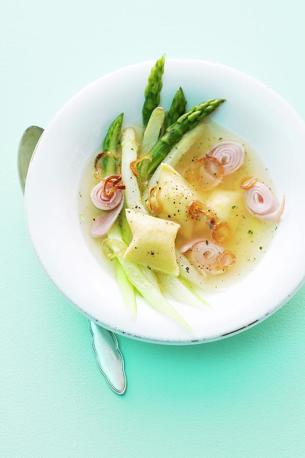 Asparagus Broth With Dumplings And Onion Rings Photograph by Michael ...