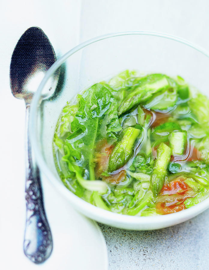 Asparagus, Cucumber, Baby Spinach Leaves And Cherry Tomato Cold Soup Photograph by Bilic