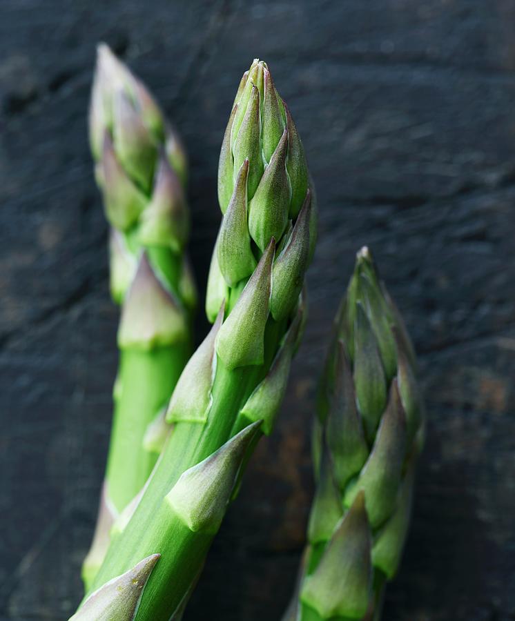 Asparagus Tips Photograph by Lars Ranek