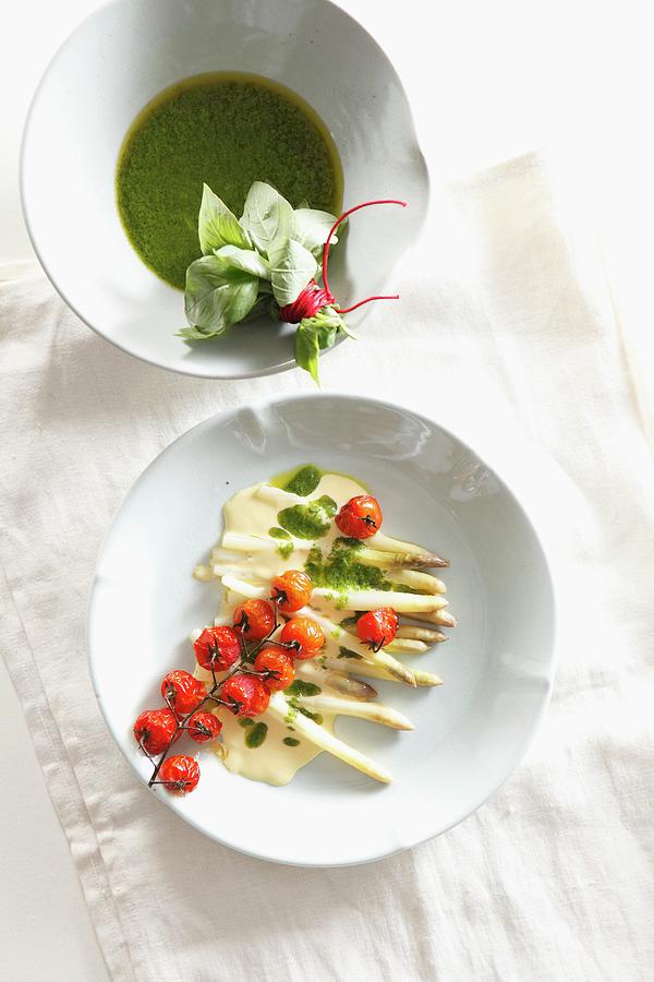 Asparagus With Hollandaise Sauce, Roasted Tomatoes And Basil And Lemon Oil Photograph by Great Stock!