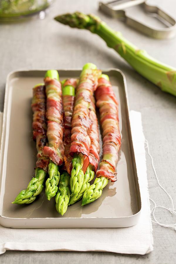 Asparagus Wrapped In Ham Photograph by Sandra Krimshandl-tauscher