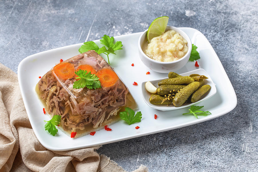 Aspic With Pickled Gherkin And Horseradish Sauce. Kholodets Is A Jellied Meat Dish Of Traditional Russian Cuisine. Photograph by Andrey Maslakov