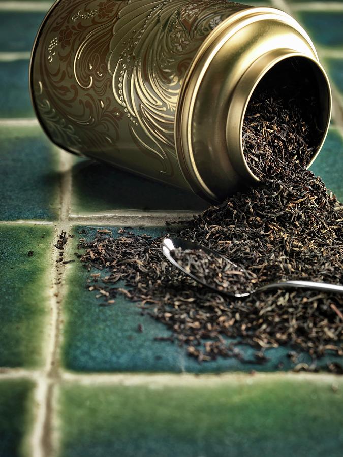 Assam Tea Leaves In An Overturned Tin Photograph by Jonathan Gregson