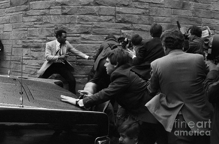 Assassination Attempt On Ronald Reagan Photograph by Bettmann