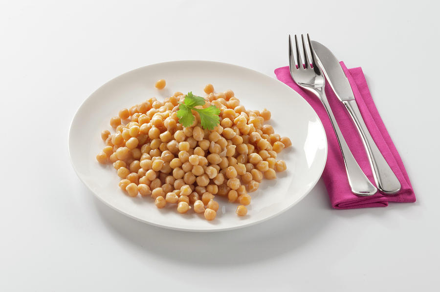 Vegetable Photograph - Assiette De Pois Chiches Sur Fond Blanc Plate Of Chickpeas On A White Background by Studio - Photocuisine