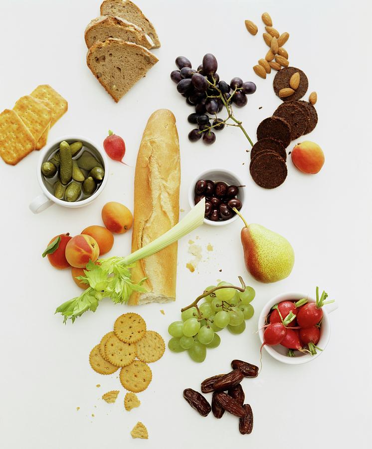Assorted Breads, Crackers, Fruit And Vegetables Photograph by Michael Wissing