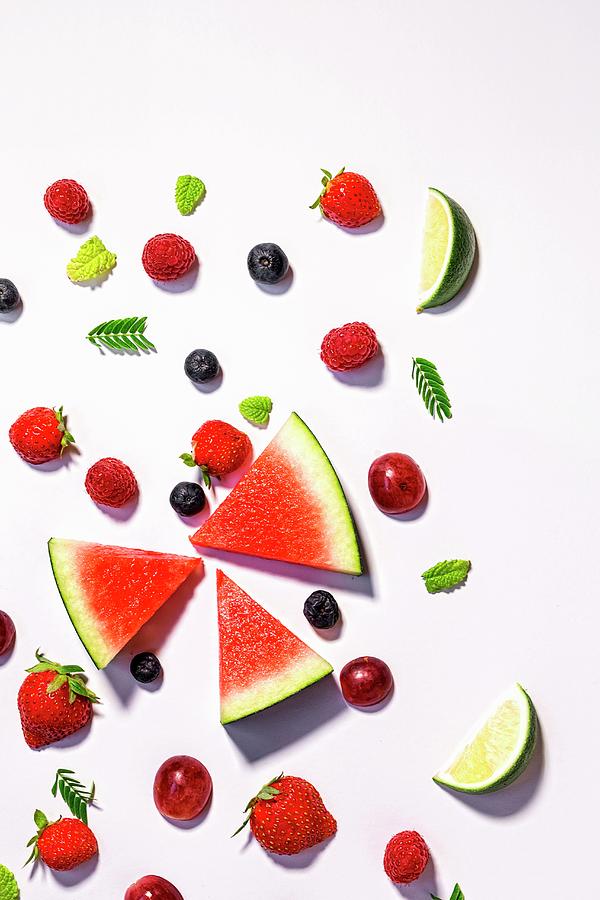 Assorted Fresh Fruits On A White Background a Symbolic Image For Dieting Photograph by Eduardo Lopez Coronado