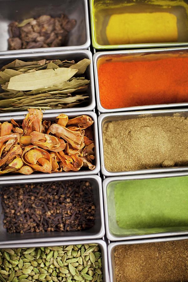 Assorted Herbs And Spices Photograph by Jan Prerovsky