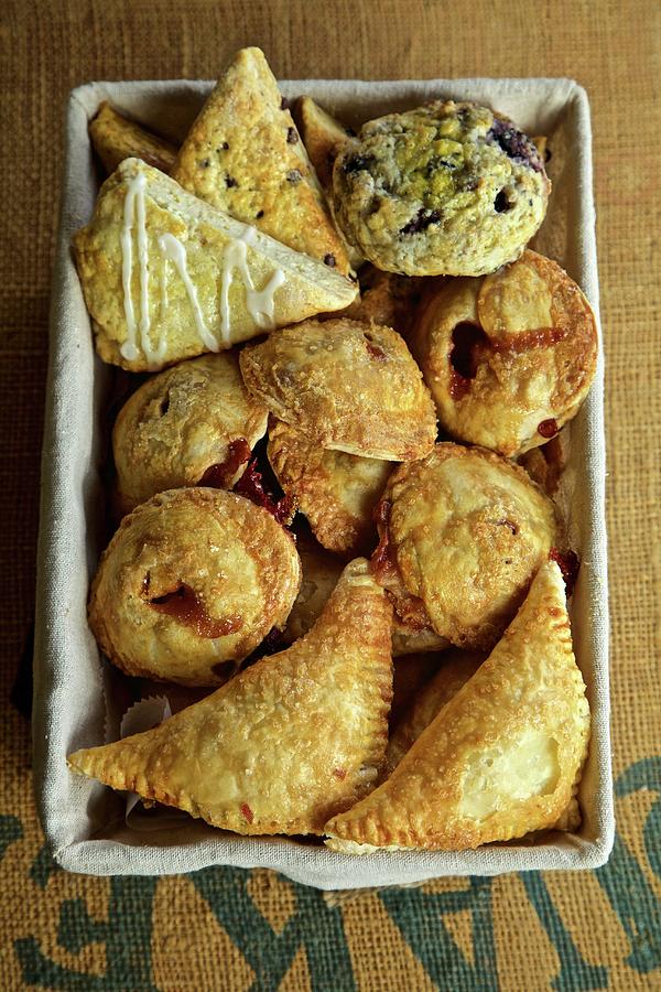 Assortment Of Baked Goods, Apple Turnovers, Scones, Muffins Photograph by Andre Baranowski