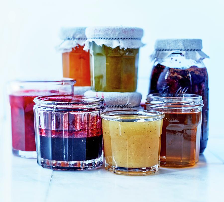 Assortment Of Homemade Jars Of Jam Photograph by Balme