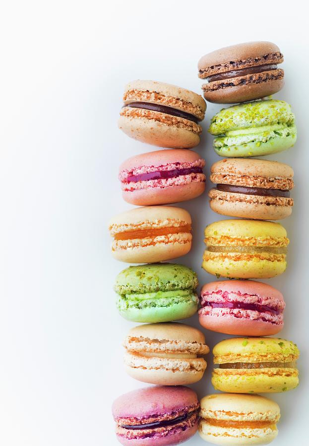 Assortment Of Macarons On A White Background Photograph by Roulier-turiot
