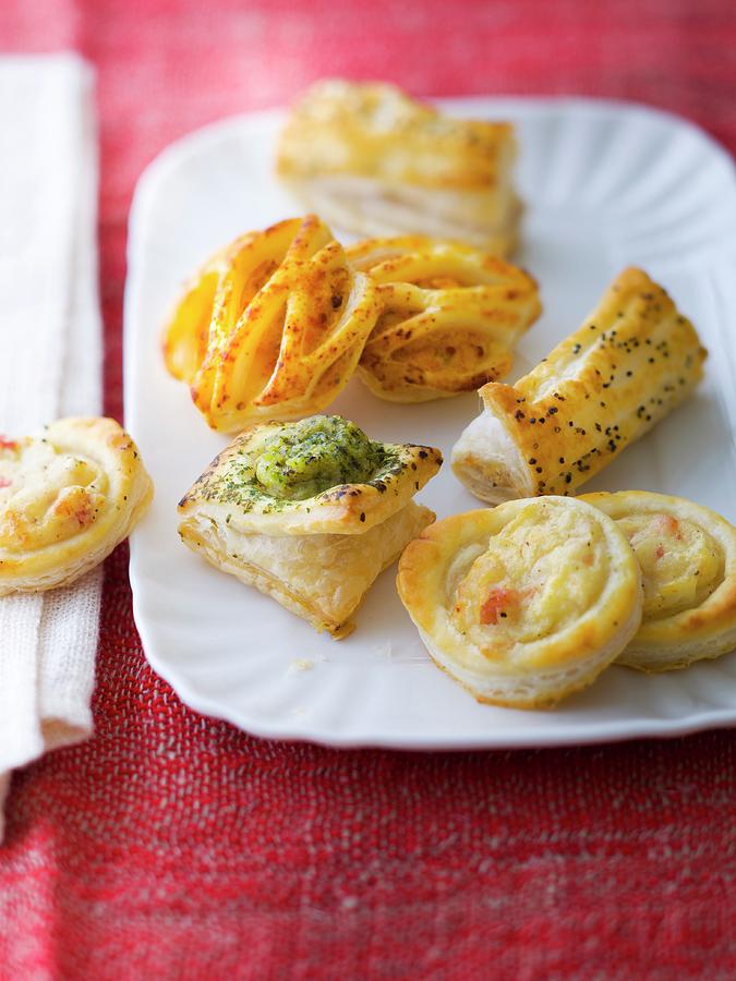 Assortment Of Puff Pastry Appetizers Photograph by Roulier-turiot ...