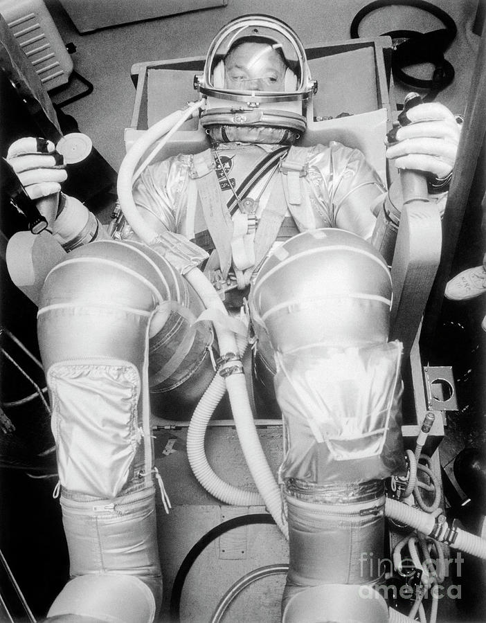 Astronaut L Gordon Cooper Sitting Photograph by Bettmann
