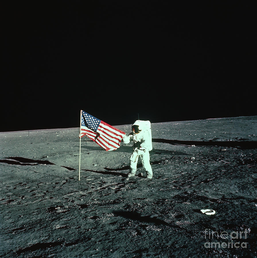 Astronaut Unfurling A United States Photograph by Bettmann