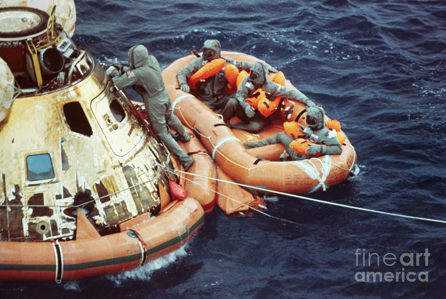 Astronauts Waiting In Life Raft Photograph by Bettmann