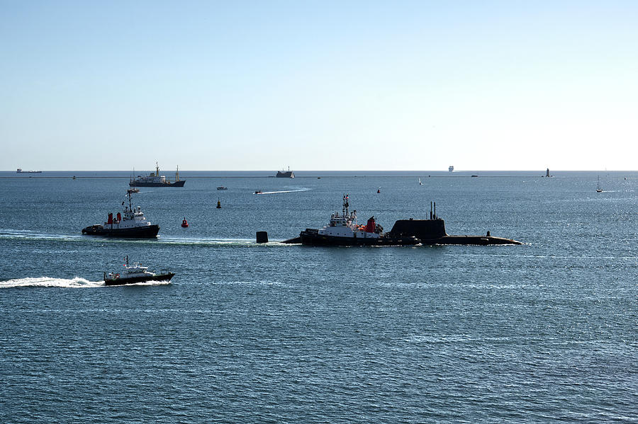 Astute class SSN under escort on Plymouth Sound Photograph by Chris Day
