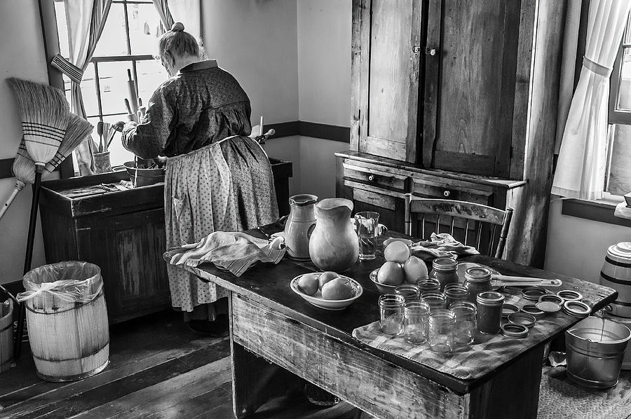 Woman Photograph - At The Kitchen Sink by Andrew Beavis