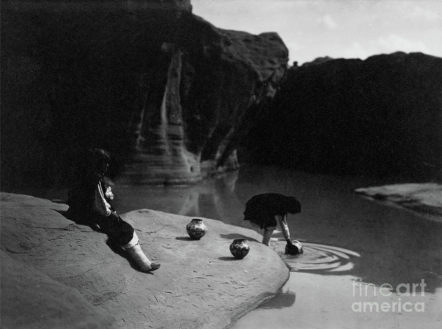 At The Old Well Of Acoma, New Mexico, Circa 1904 Photograph by Edward Sheriff Curtis