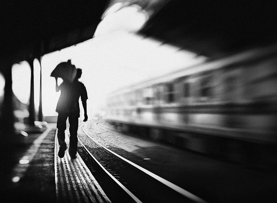 Black And White Photograph - At The Station Series: 4/5. Trader & Train by Sebastian Kisworo
