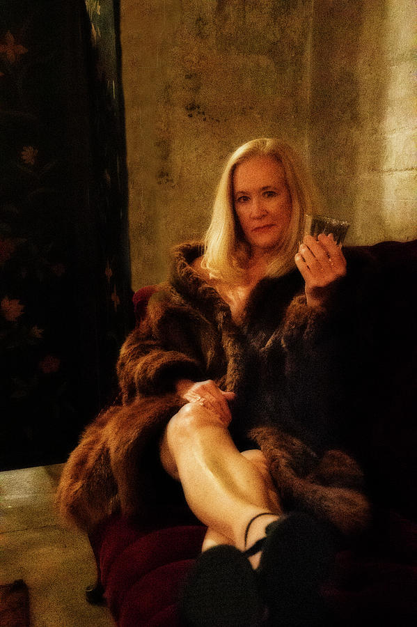 Attractive older lady in fur with drink in her hand Photograph by Dan Friend