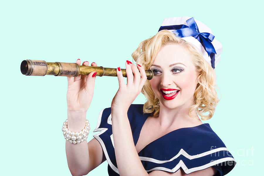 Attractive pinup sailor girl with a monocular Photograph by Jorgo Photography