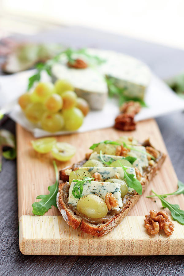 Aubergine Caviar, White Grapes, Fourme Dambert And Walnuts On Toast Photograph by Sauvages
