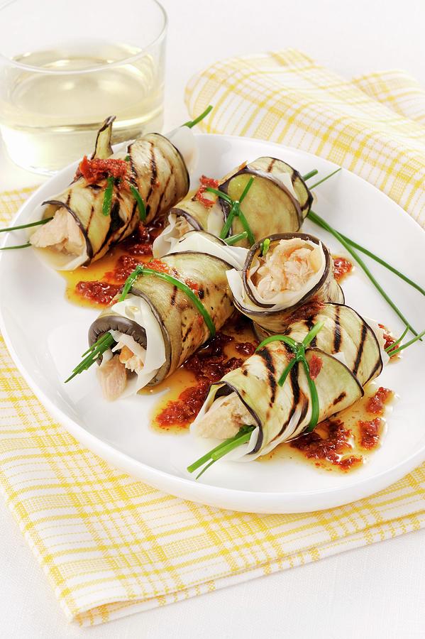 Aubergine Rolls Filled With Fish In A Tomato Oil Photograph by Franco Pizzochero