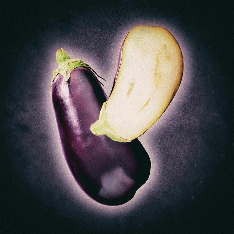 Aubergines, Whole And Halved Photograph by Peter Rees