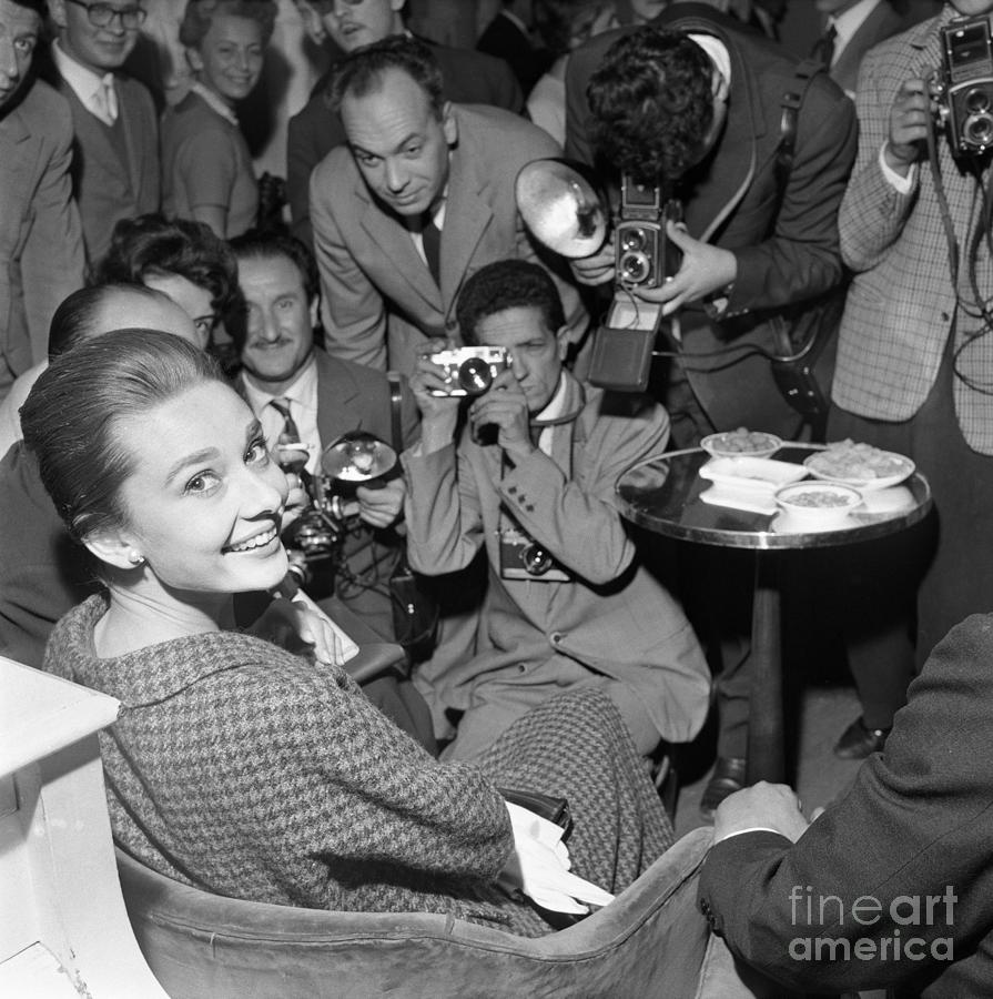 Audrey Hepburn Laughing At Press Photograph by Bettmann