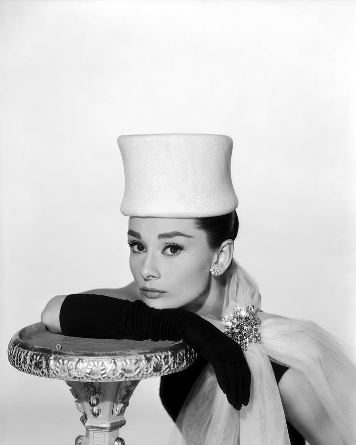 Audrey Hepburn Photograph - Audrey Hepburn Leaning On Table by Globe Photos