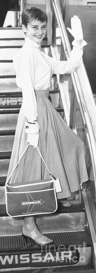 Audrey Hepburn Waving From Airplane Photograph by Bettmann