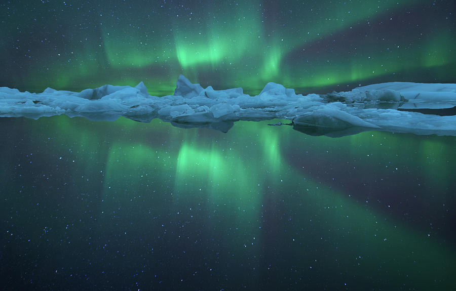 Aurora Reflection At Jokulsarlon Photograph by Peerakit Jirachetthakun Aurora Reflection At Jokulsarlon Photograph by Peerakit Jirachetthakun