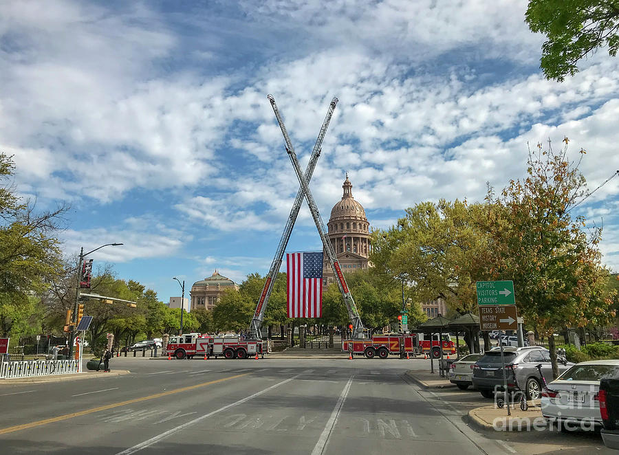 Crane Photograph - Austin Fire Department fire engine cranes frame the US Flag in f by Dan Herron