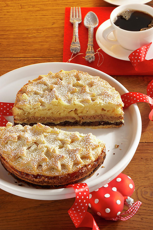 Austrian New Years Cake With A Nut, Poppyseed And Apple Filling And Shortcrust Stars Photograph by Teubner Foodfoto