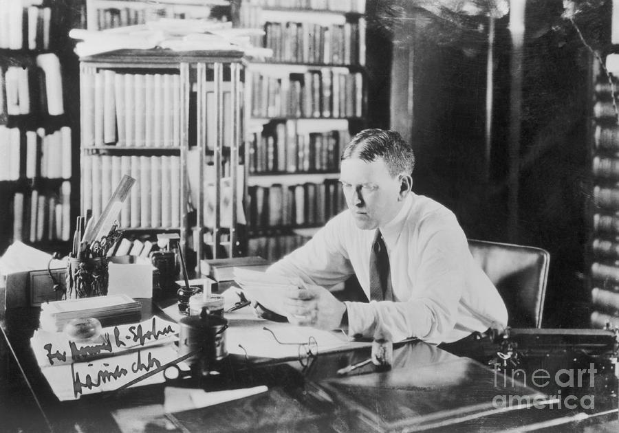 Author H. L. Mencken Reading At His Desk Photograph by Bettmann
