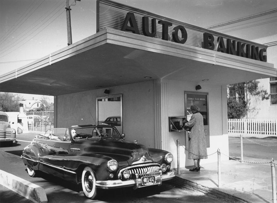 Auto Banking Photograph by Kurt Hutton