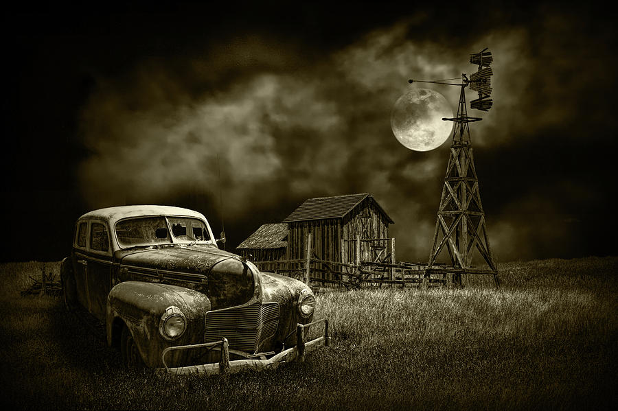 Automobile and Barn with Windmill by Moon Light in Sepia Tone Photograph by Randall Nyhof