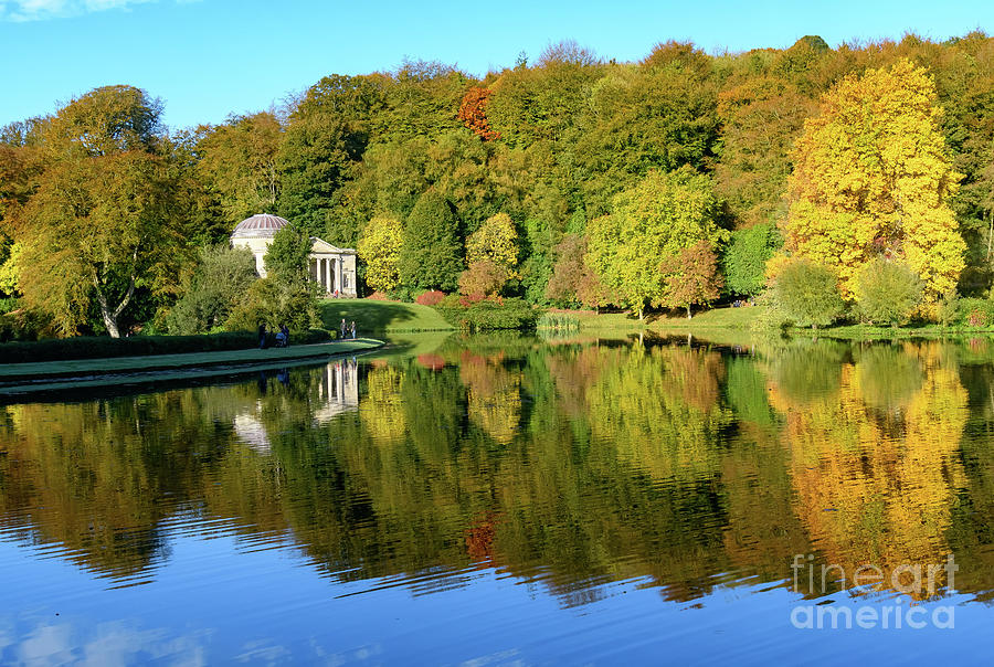 Autumn across the lake Photograph by Colin Rayner