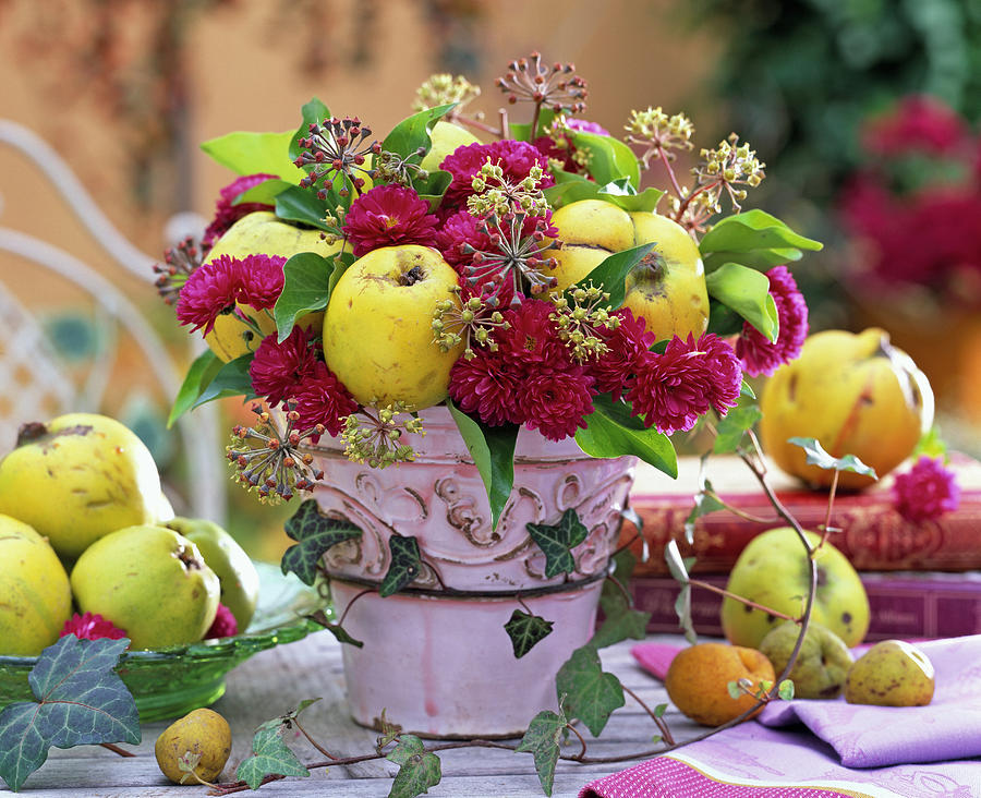 Autumn Bouquet In Pink Pot With Cydonia Oblonga quince Photograph by Friedrich Strauss