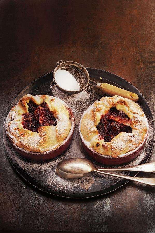 Autumn Fig Tarts Dusted With Icing Sugar Photograph by John Hay