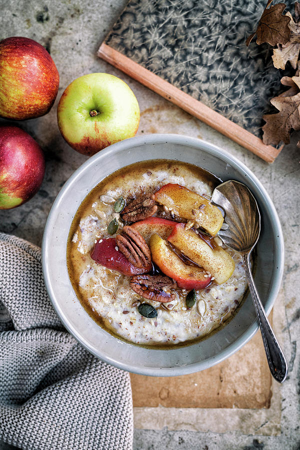 Autumn Porridge With Maple Syrup And Apples Photograph by Lucy Parissi