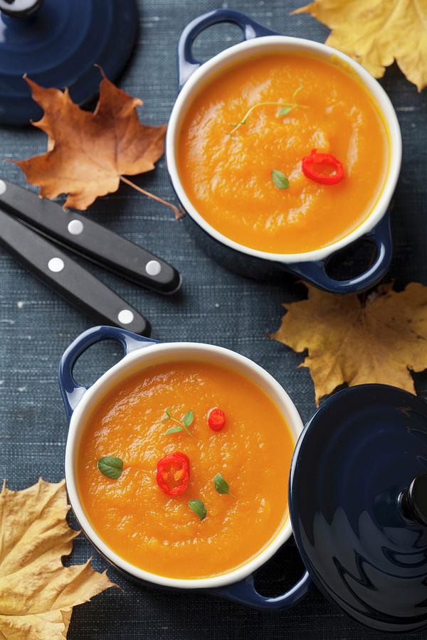 Autumn Squash Soup With Sliced Chillies And Thyme Photograph by Miltsova, Olga