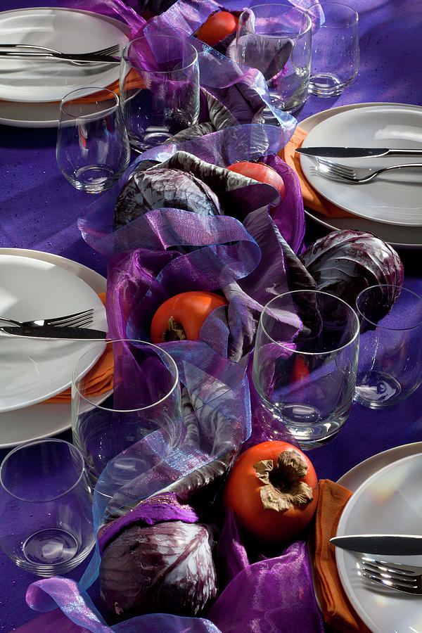 Autumn Table Set In Purple Tones With Red Cabbage And Persimmon Photograph by Angela Francisca Endress