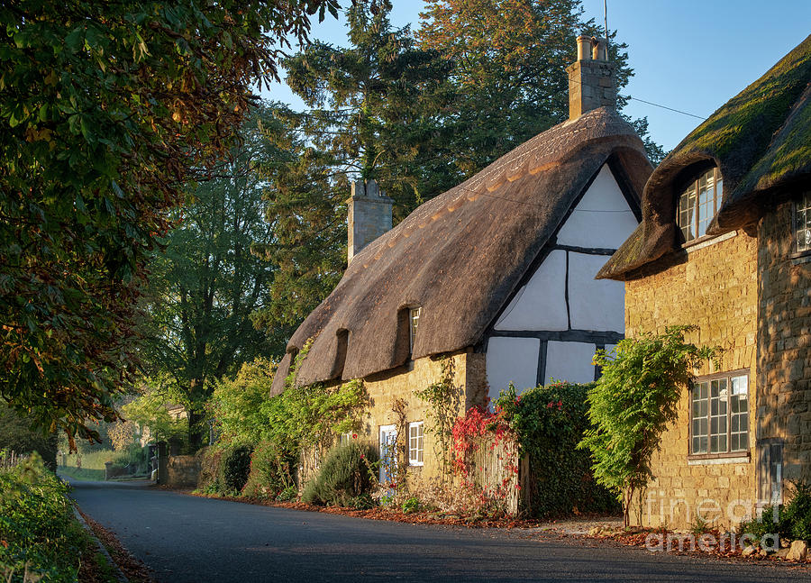 Autumn Thatched Cottage in Broadway Photograph by Tim Gainey