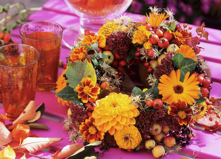 Autumn Wreath Of Dahlias, Tagetes And Marigolds Photograph by Friedrich Strauss